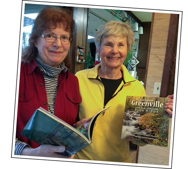 Pam and Janie admire the finished books.